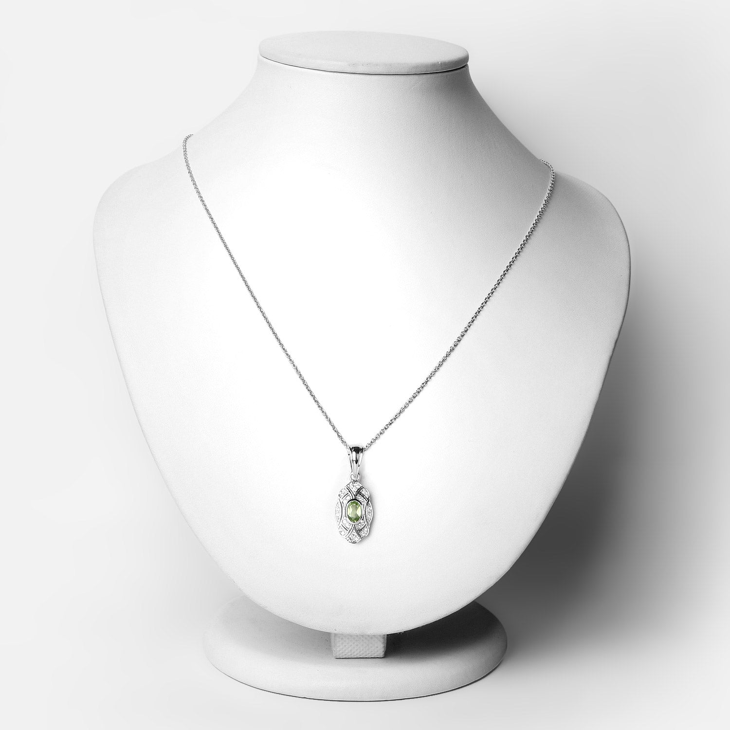0.55 Carat Genuine Peridot and White Topaz .925 Sterling Silver Pendant on sale at MyriadMart