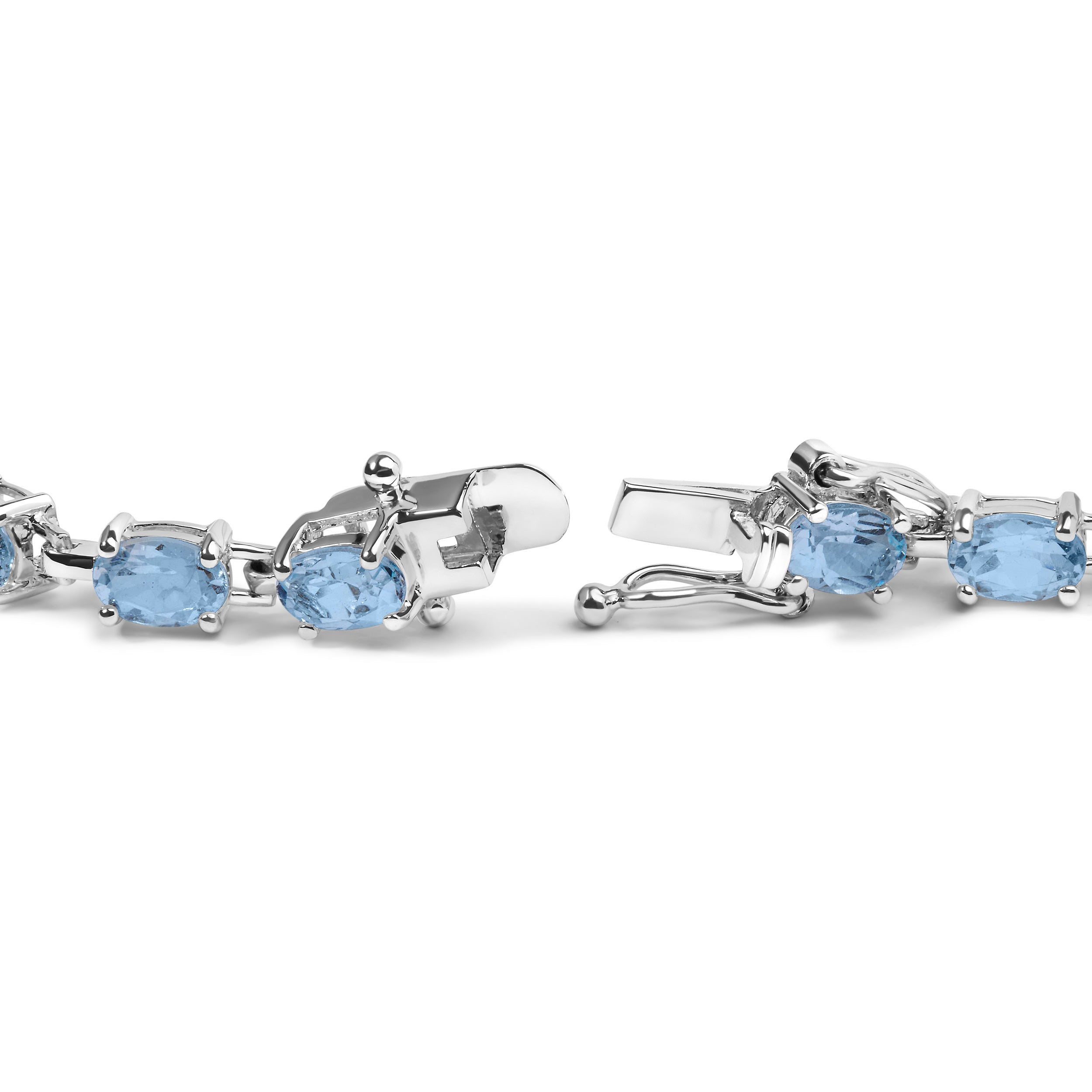 .925 Sterling Silver 11.0 Cttw Oval Shaped Created Light Blue Topaz Link Bracelet - 7 inch on sale at MyriadMart