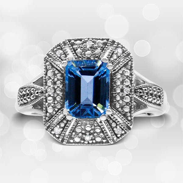 .925 Sterling Silver Diamond Accent and 8X6 mm Emerald-Shape Blue Topaz Ring I-J Color, I2-I3 Clarity - Ring Size 7 on sale at MyriadMart