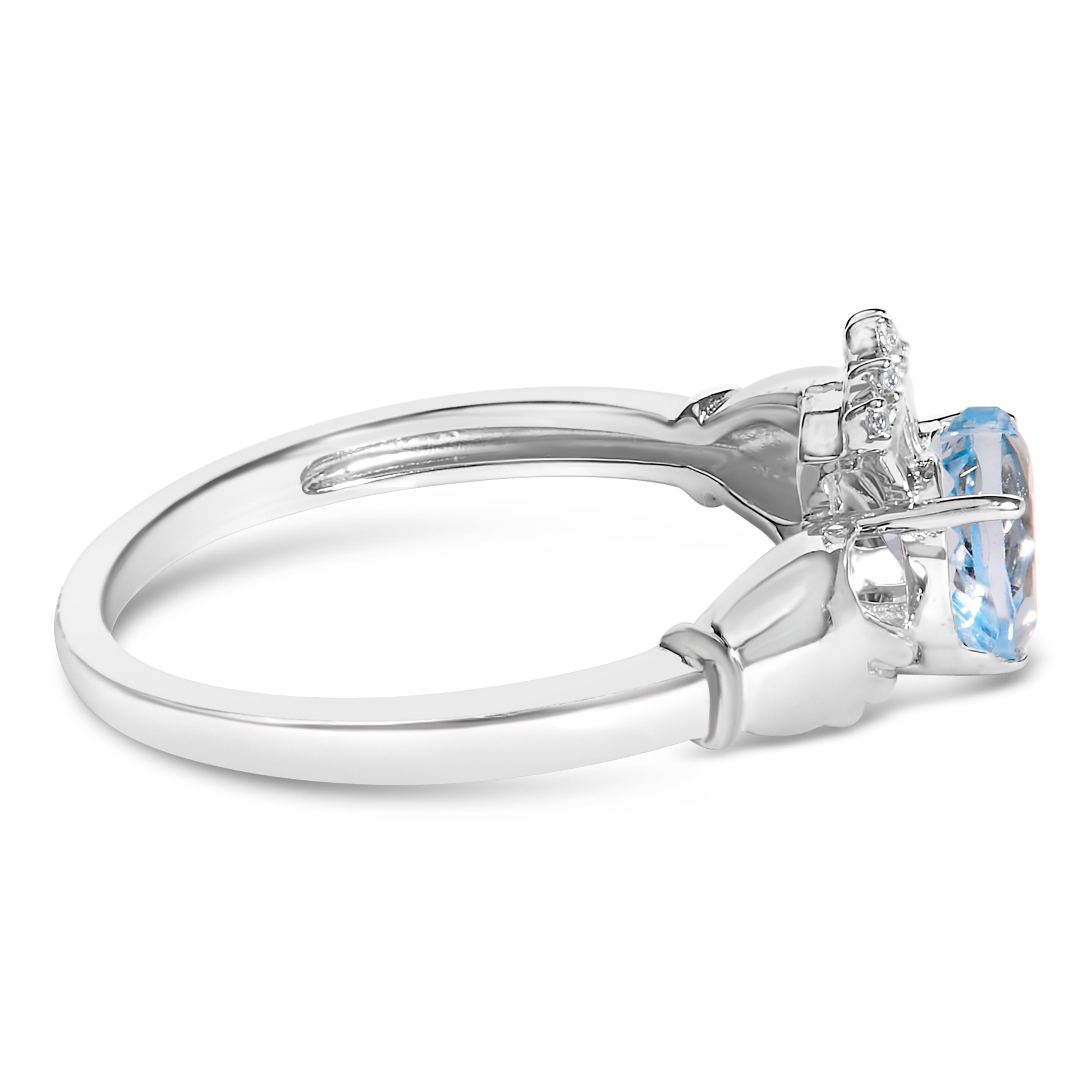 Sterling Silver Blue Topaz Heart Claddagh Ring on sale at MyriadMart
