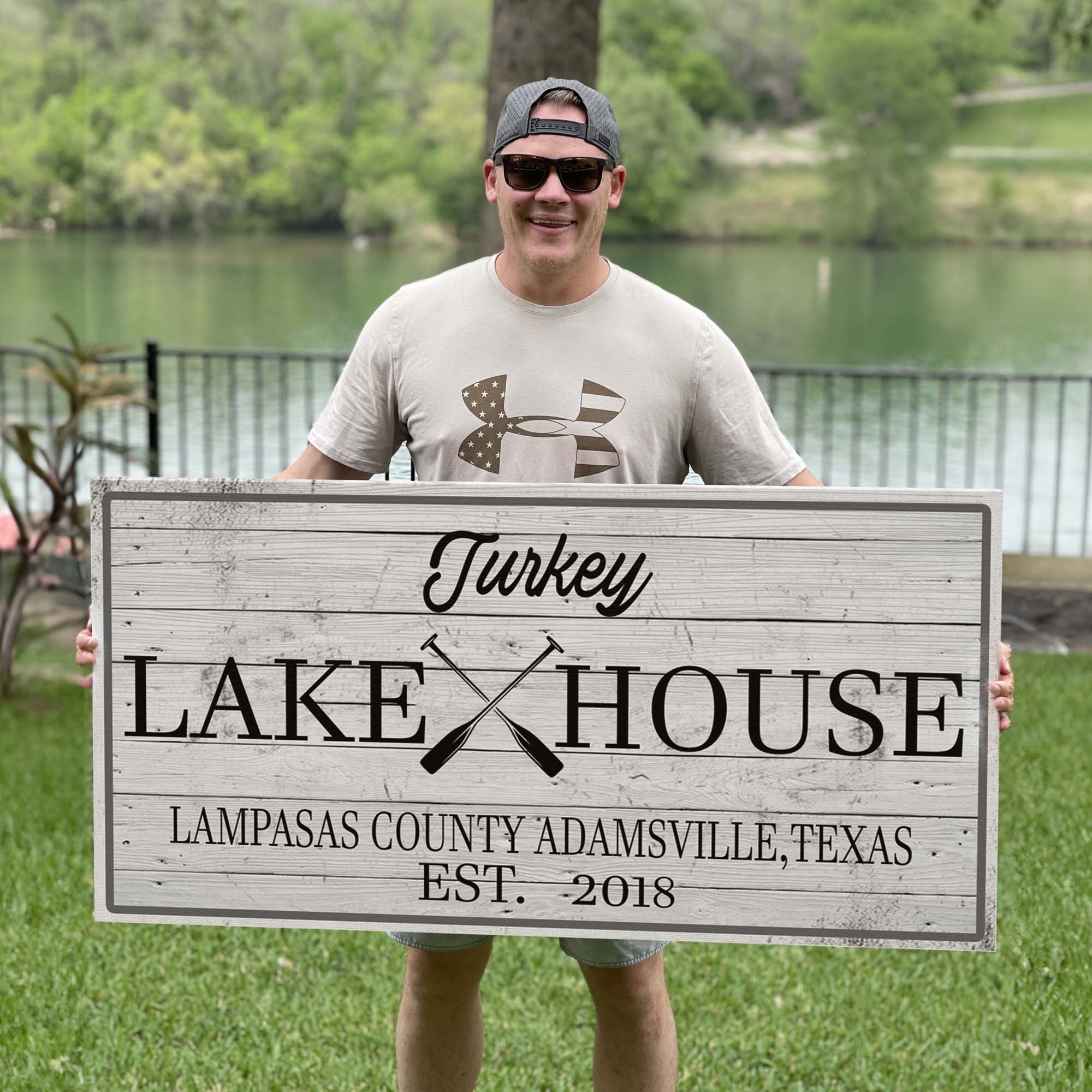 Family Lake House Paddle Sign on sale at MyriadMart