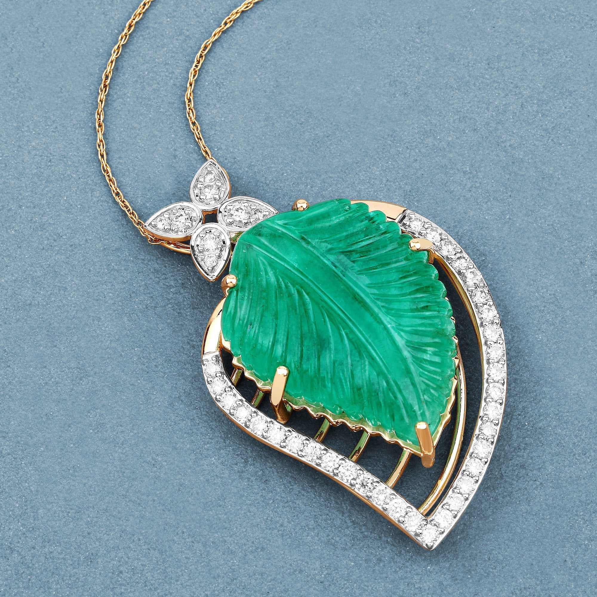 29.67 Carat Genuine Colombian Emerald and White Diamond 14K Yellow Gold Pendant on sale at MyriadMart