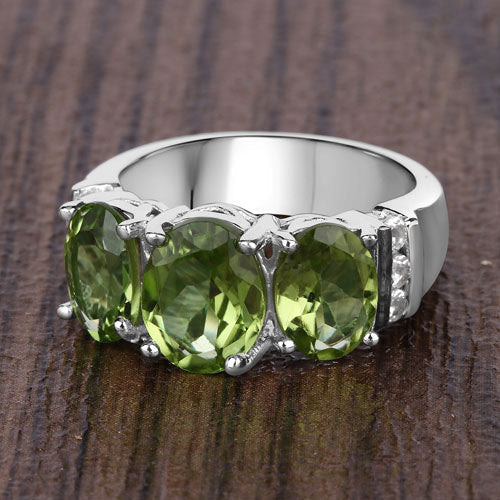 4.14 Carat Genuine Peridot and White Topaz .925 Sterling Silver Ring on sale at MyriadMart