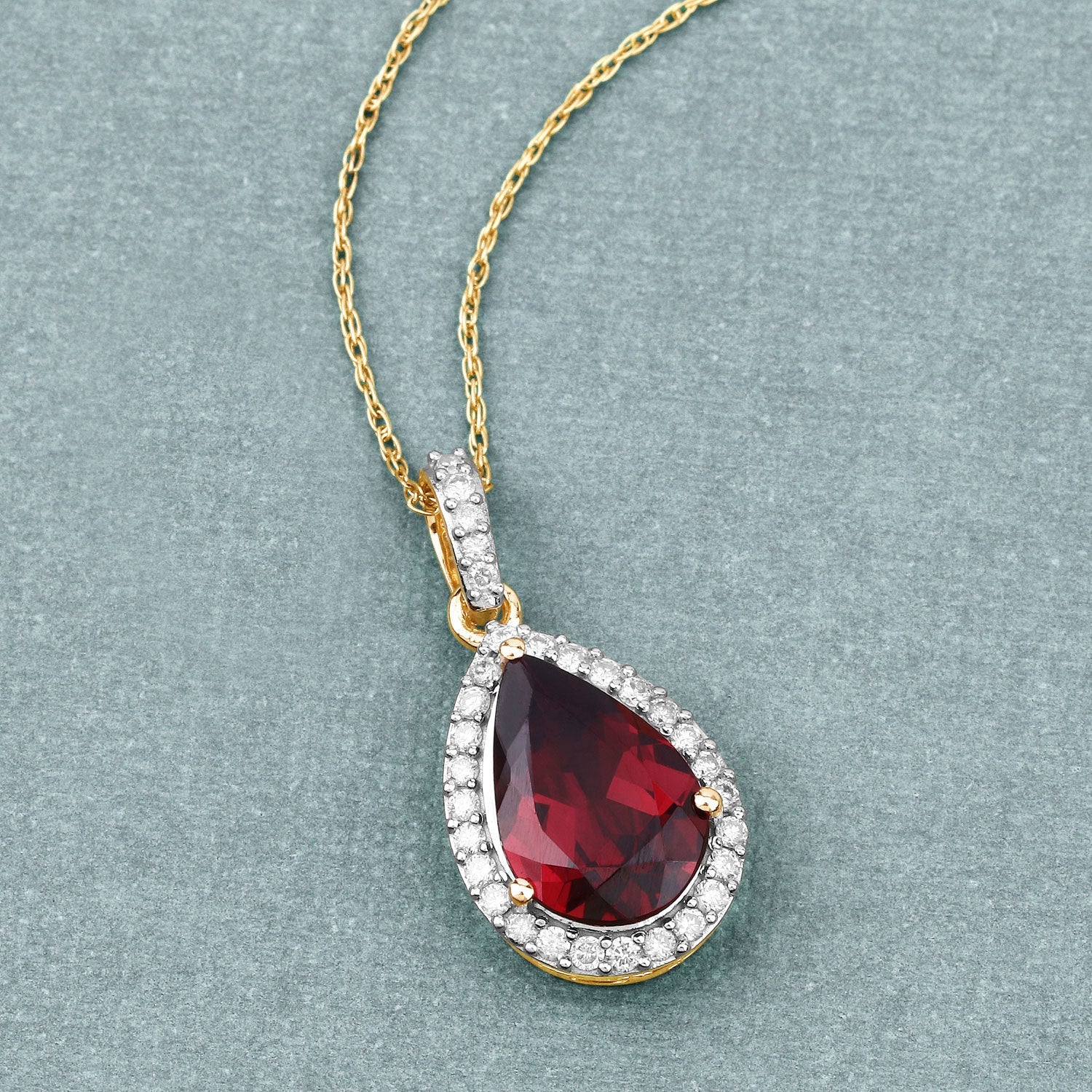 3.29 Carat Genuine Rhodolite and White Diamond 14K Yellow Gold Pendant on sale at MyriadMart