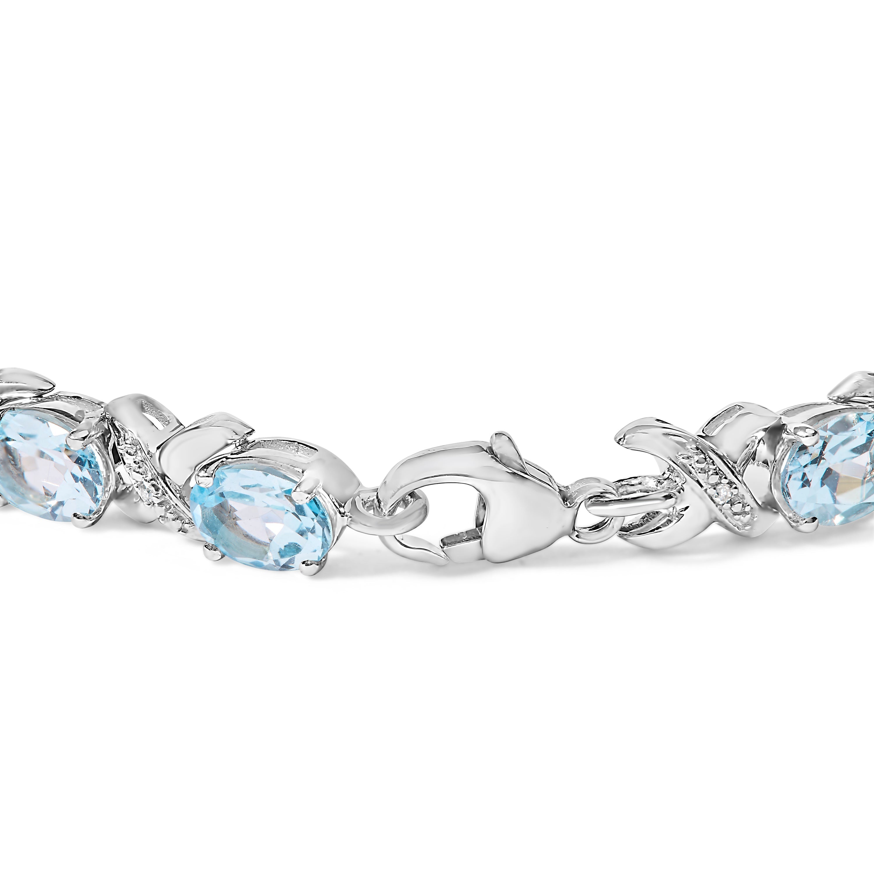 .925 Sterling Silver 16.0 Cttw Oval Blue Topaz and Diamond Accent Tennis X Link Bracelet I-J Color, I1-I2 Clarity - Size 7" Inch on sale at MyriadMart
