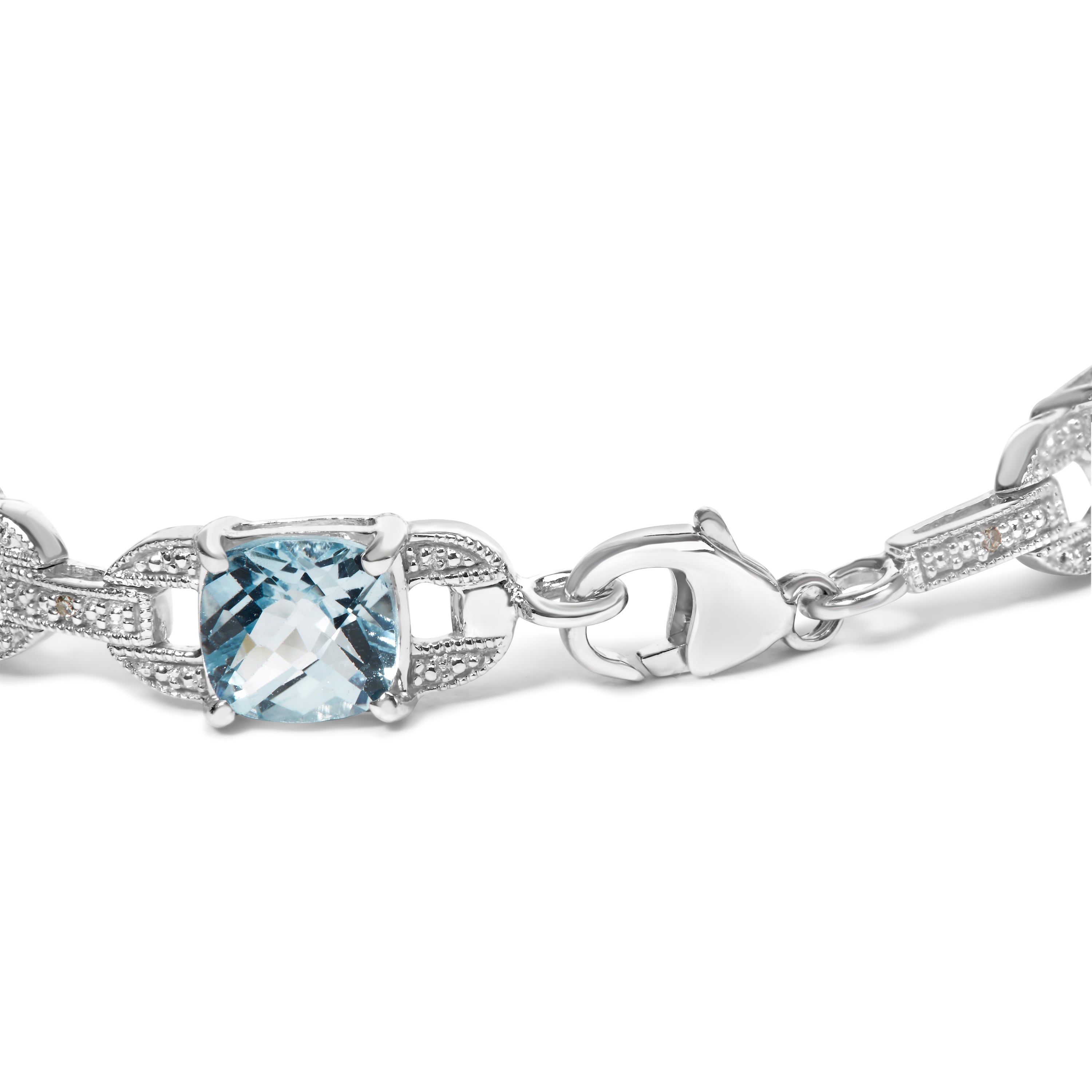 .925 Sterling Silver 7x7 mm Cushion Cut Blue Topaz and 1/20 cttw Round Cut Diamond Fashion Tennis Bracelet I-J Color, I1-I2 Clarity - 7" on sale at MyriadMart