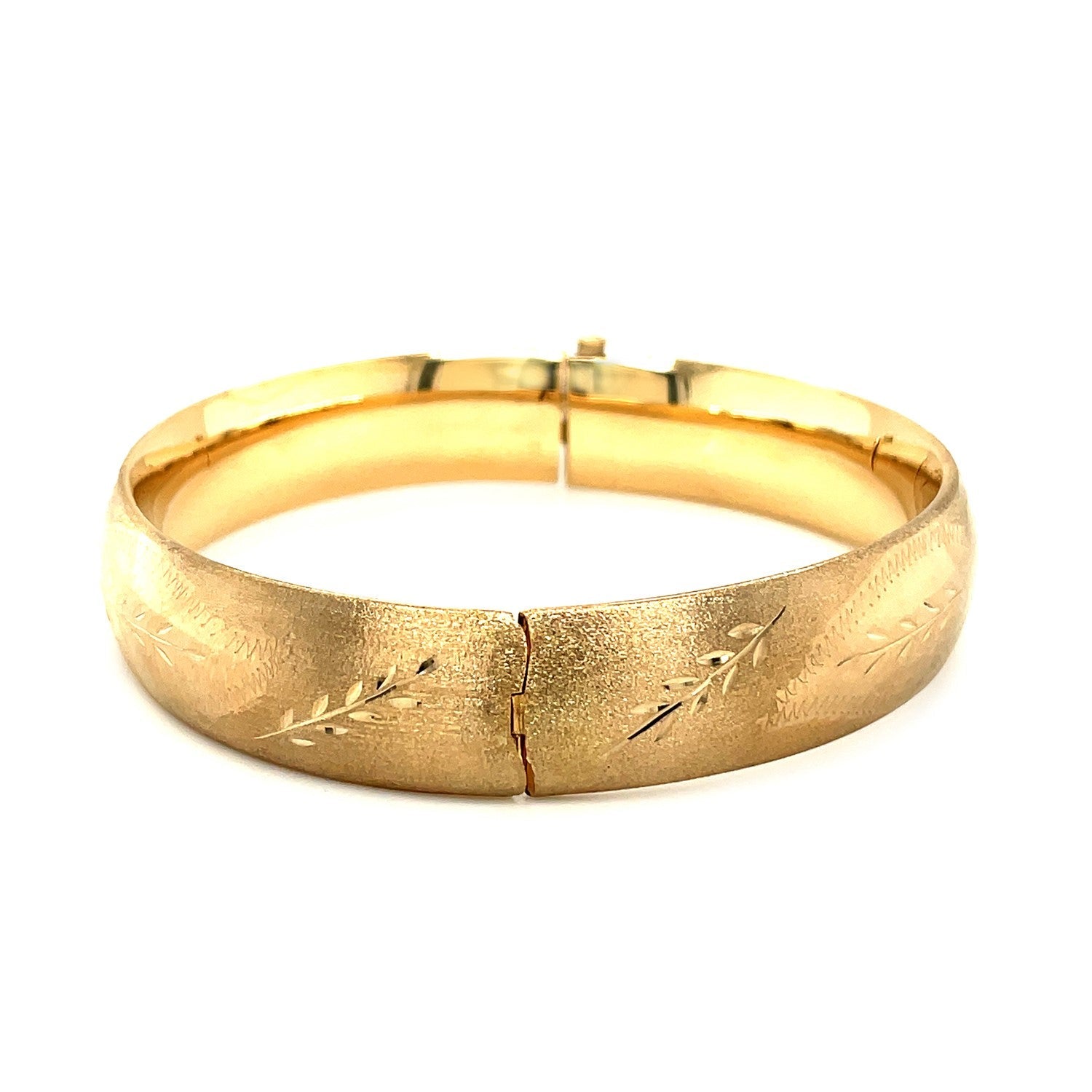 Classic Floral Carved Bangle in 14k Yellow Gold 13.5mm on sale at MyriadMart