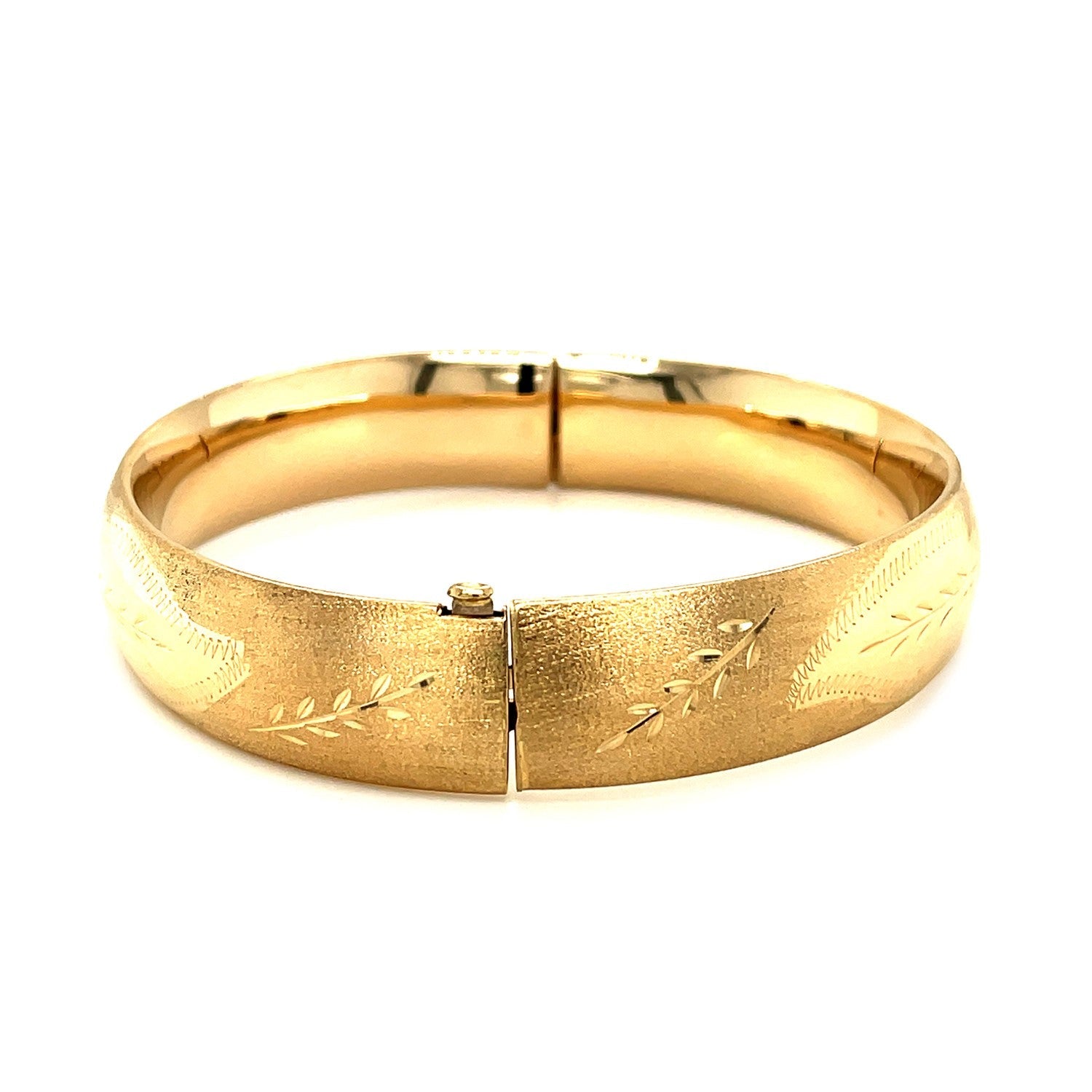 Classic Floral Carved Bangle in 14k Yellow Gold 13.5mm on sale at MyriadMart