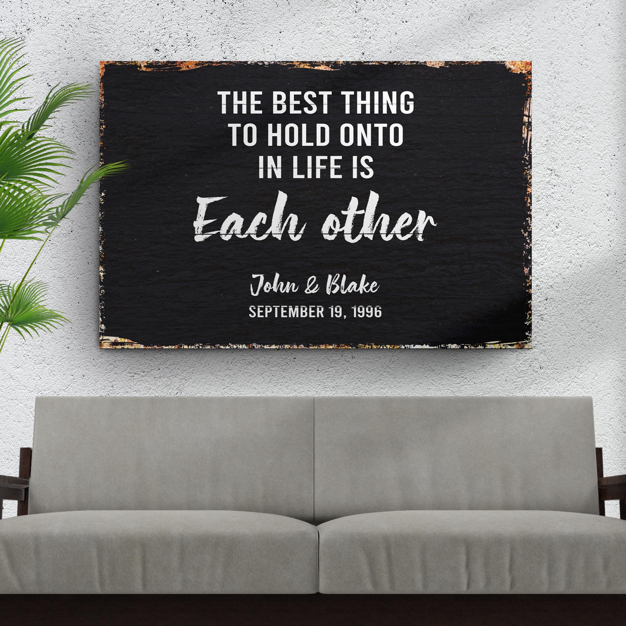 The Best Thing To Hold Onto Life Is Each Other Sign on sale at MyriadMart