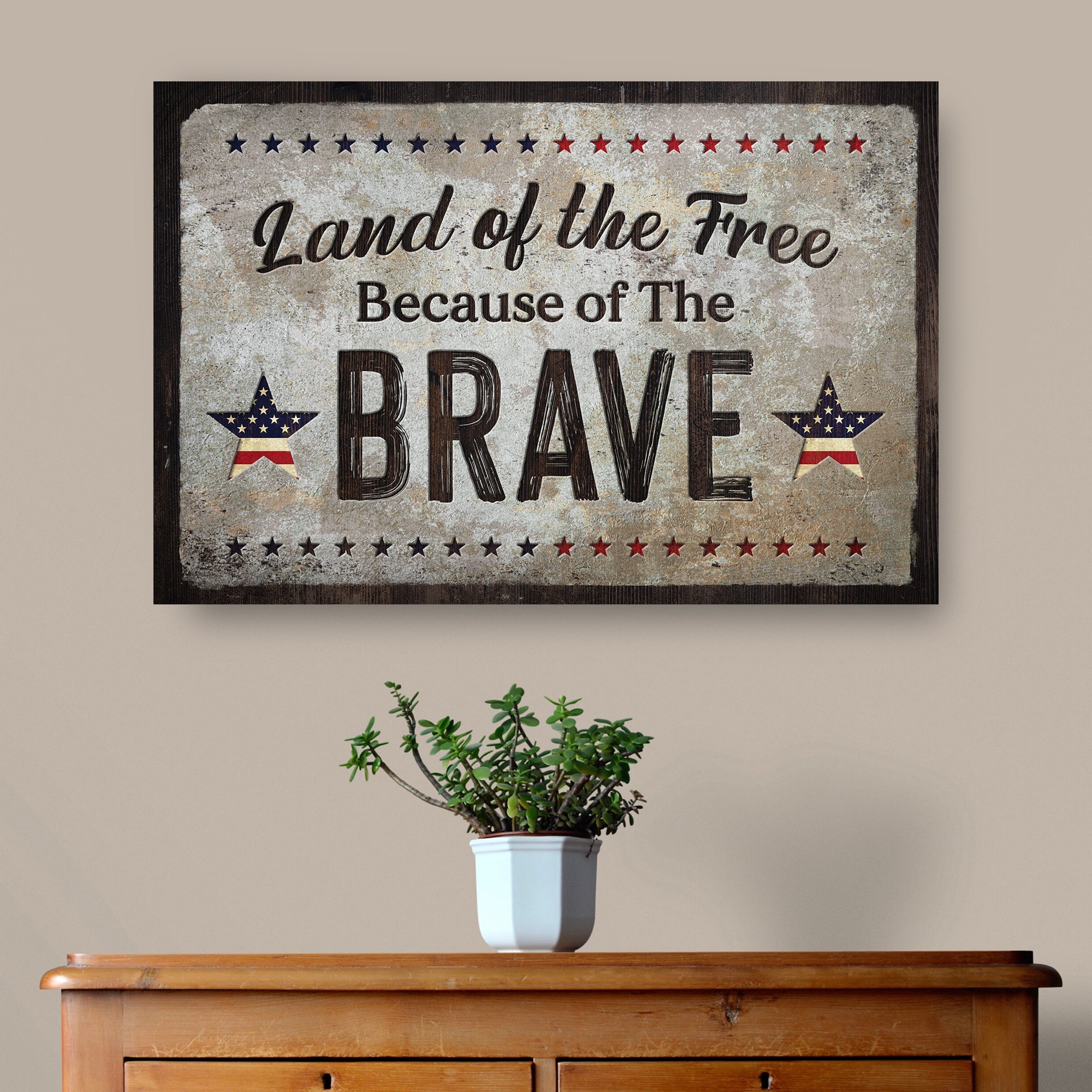 Land Of The Free Because Of The Brave Sign on sale at MyriadMart