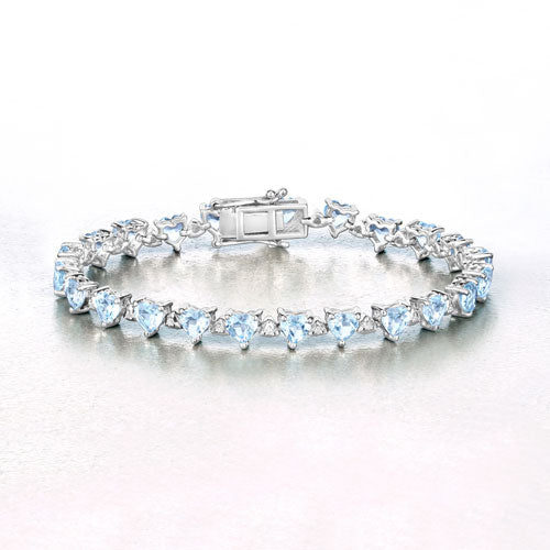 11.62 Carat Genuine Blue Topaz and White Diamond .925 Sterling Silver Bracelet on sale at MyriadMart