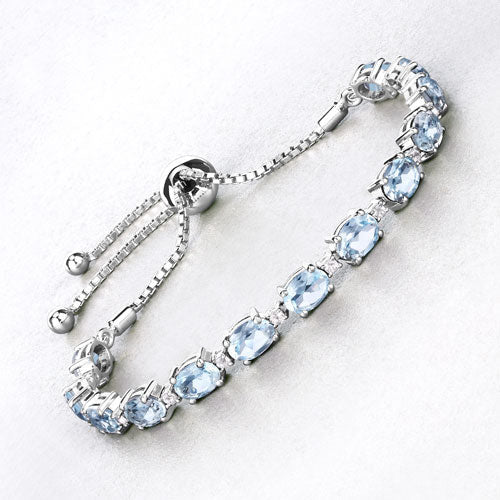 12.83 Carat Genuine Blue Topaz and White Topaz .925 Sterling Silver Bracelet on sale at MyriadMart