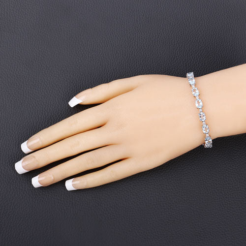 12.83 Carat Genuine Blue Topaz and White Topaz .925 Sterling Silver Bracelet on sale at MyriadMart
