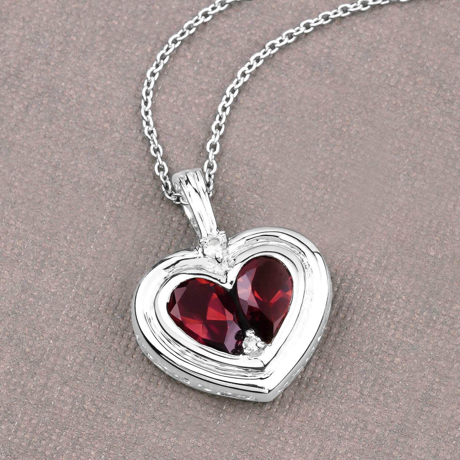 2.66 Carat Genuine Garnet and White Topaz .925 Sterling Silver Pendant on sale at MyriadMart