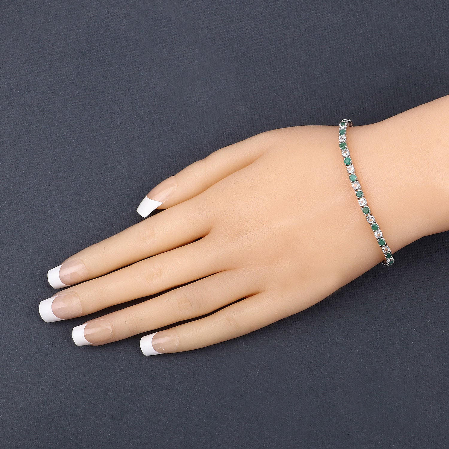 5.77 Carat Genuine Emerald and White Topaz .925 Sterling Silver Bracelet on sale at MyriadMart