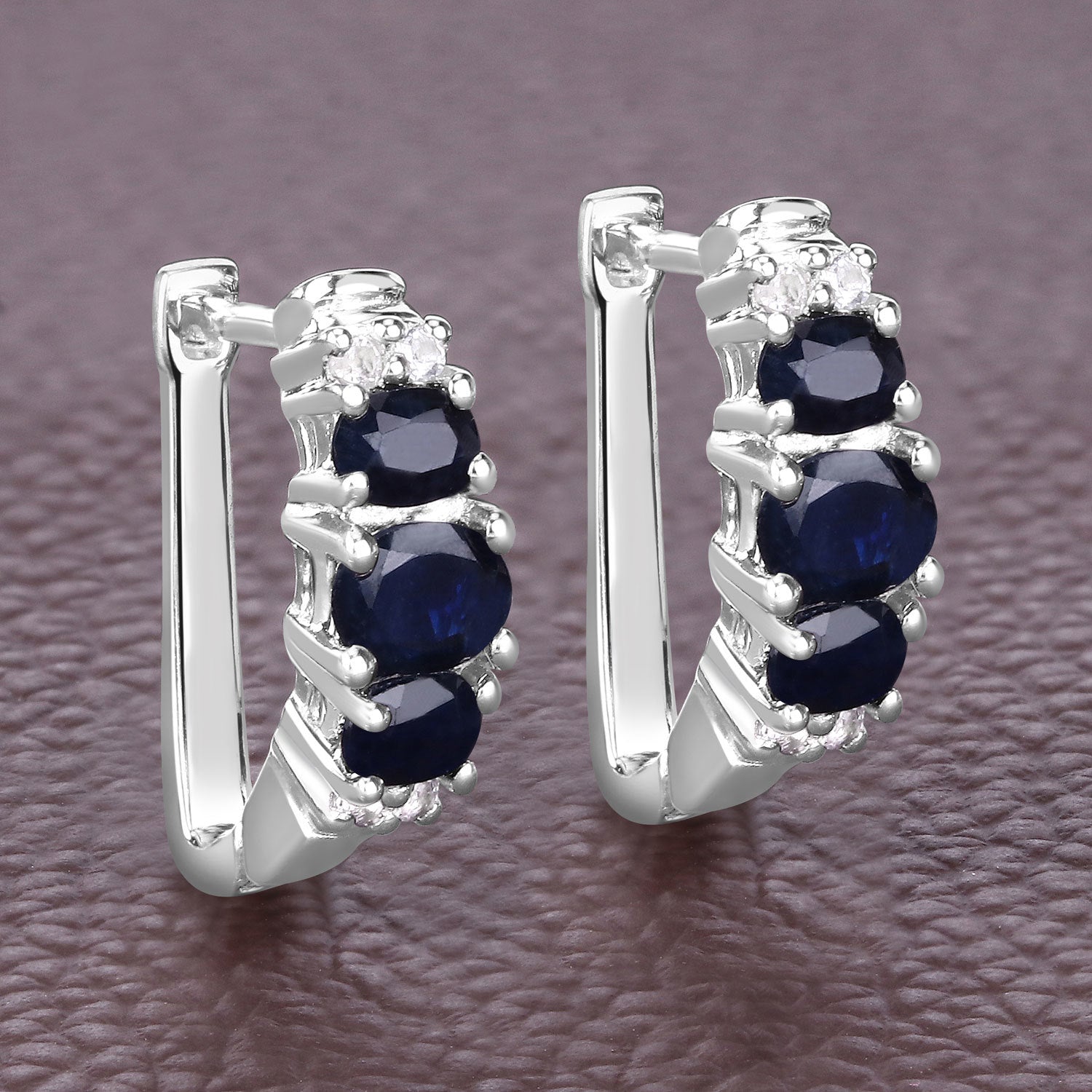 1.66 Carat Genuine Blue Sapphire and White Topaz .925 Sterling Silver Earrings on sale at MyriadMart
