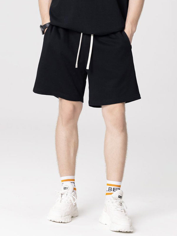 Men's solid color loose casual sports shorts